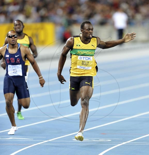 Ricardo Makyn/Staff Photographer
Usaine Bolt winning the gold medal in the men's 200 meters final, Daegu September 3, 2011.r