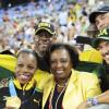 Ricardo Makyn/Staff Photographer
Minister of Sports, Olivia 'Babsy' Grange and  other Jamaicans celebrating in Daegu pose with a victorious Veronica Campbell-Brown,  after she received her gold medal, Daegu yesterday.