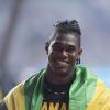 Silver medalist in the men discus event Fedrick Dacres celebrates second place at the