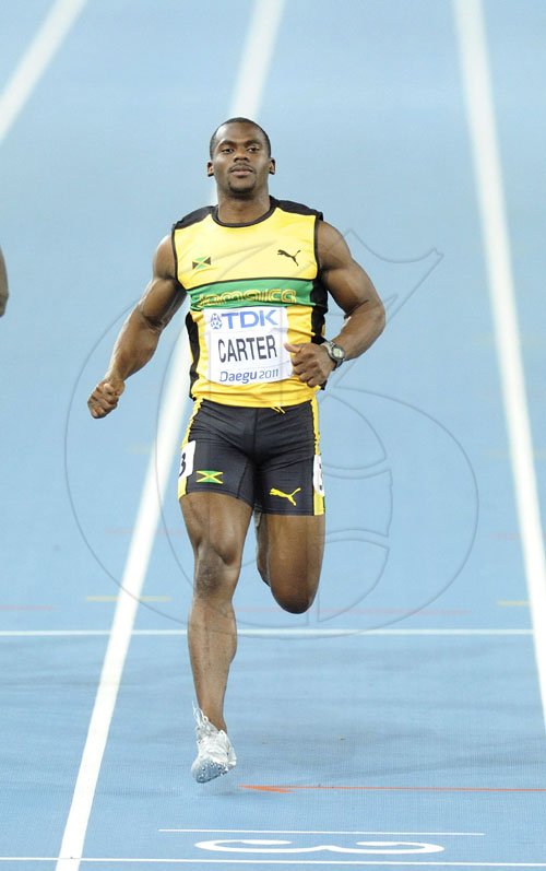 Ricardo Makyn/Staff Photographer
Jamaica Nesta Carter wins his heat in the mens 100 metres, at the World Athletics Championships in Daegu, South Korea, yesterday.