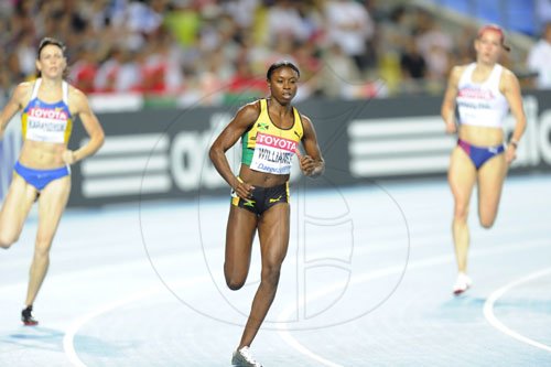 Ricardo Makyn/Staff Photographer
Jamaica Shericka Williams, ahead in the womens 400 meters.