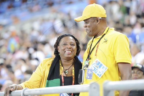 Ricardo Makyn/Staff Photographer 
Youth, Sports and Culture Minister Olivia Grange sends time with Wellesley Bolt, father of Usain Bolt inside the stadium in Daegu, South Korea.
