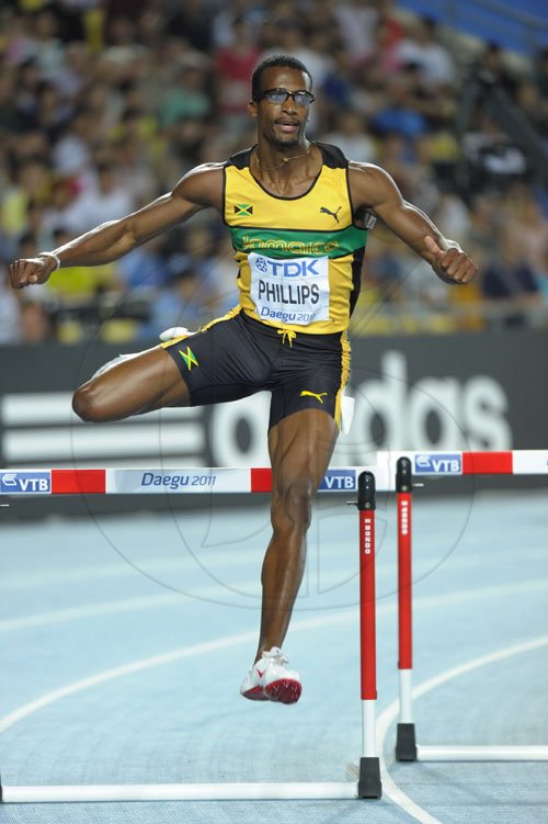 Ricardo Makyn/Staff Photographer
Isa Phillips ,400 hurdles semi. August 30, 2011.