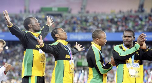 Ricardo Makyn/Staff Photographer
From left: Usain Bolt, Yohan Blake, Michael Frater and Nesta Carter, members of the record-breaking 4x100m team.