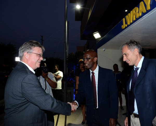 Winston Sill/Freelance Photographer
PUBLIC AFFAIRS and BUSINESS DESKS:----- J Wray and Nephew Limited, a Gruppo Campari Company present the Official Opening of the JWN Corporate Office,  at Dominica Drive, New Kingston on Thursday night April 10, 2014. Here are David Fitton (left), Britisn High Commissioner; Clement Lawrence (centre), Managing Director, Wray and Nephew; and stefano Saccardi (right), General Counsel and Business Development Officer, Gruppo Campari.