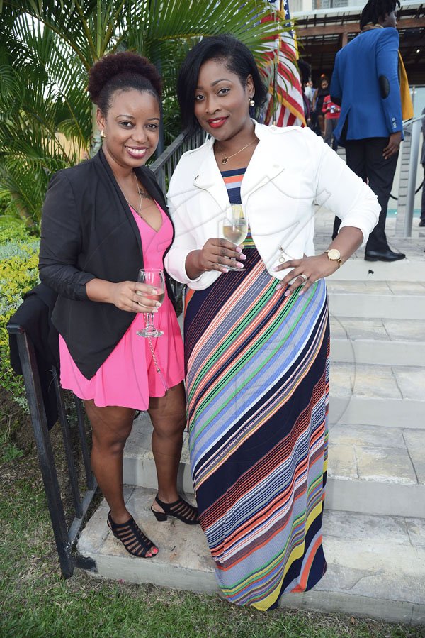 Rudolph Brown/Photographer<\n>Yaneek Page (right) shares cocktails and smiles with Kira Reneau.  *** Local Caption *** @Normal:Yaneek Page (right) shares cocktails and smiles with Kira Reneau.