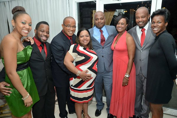 Rudolph Brown/Photographer
The Tulloch's sons pose with their wife and Girl friend from left are Roshani Howard, Romain Tulloch, Handel Tulloch, Sara Tulloch, Garwin Tulloch, Alison Tulloch, Karl Tulloch and Billie Jean Tulloch pose at their parents Sylvester and Eulyn Tulloch 40th Wedding Anniversary at the Terra Nova Hotel in Kingston on Saturday, August, 3, 2013