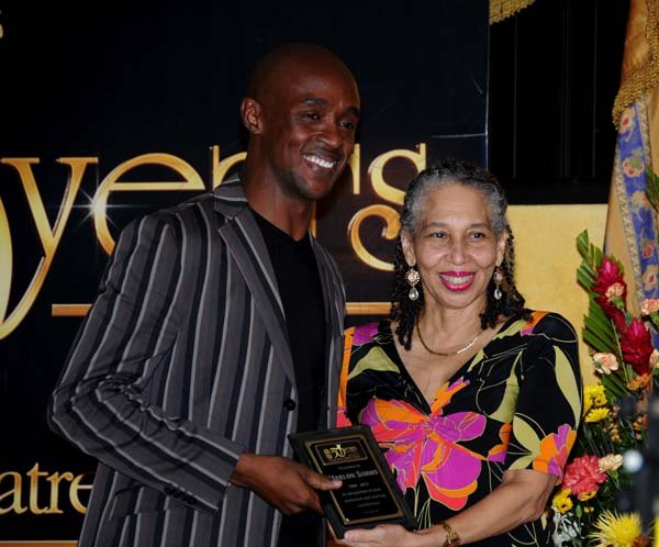 Winston Sill / Freelance Photographer
National Dance Theatre Company (NDTC) 50th Anniversary Awards Ceremony, held at Mona Visitors' Lodge, UWI, Mona on Sunday night October 28, 2012. Here rae Marlon Simms (left); and Justice Hillary Phillips (right).
