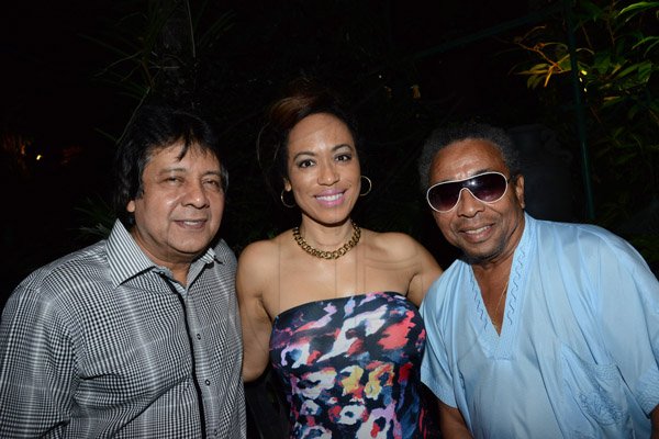 Winston Sill/Freelance Photographer
The Latin American Women's Club host fundraising St. Valentine 
`Baila Amor Dance Party, held at Mongomery Road, Stony Hill on Friday night February 21, 2014. Here are Kenny Benjamin (left); Caron Chung (centre); and Evan Williams (right).