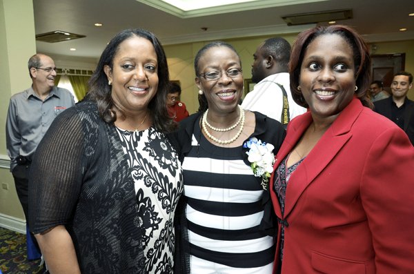 Rudolph Brown/Photographer
From left: Marcia Erskine, Christine King and her daughter Terrie Creary pose at the AAAJ Media Awards luncheon.

**************************************************************************** at the Knutsford Court Hotel in New Kingston on Wednesday, July 13-2011