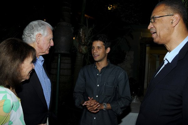 Winston Sill / Freelance Photographer
Kenny Benjamin host the American Friends of Jamaica (AFJ) at Dinner, held at Montgomery Road, Stony Hill on Tuesday night April 16, 2013. Here are Gloria Holden (left); Glen Holden (second left), former US Ambassador; Nicholas Benjamin (centre); and Rev. -----?????? (right).