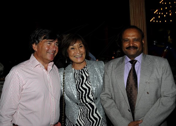 Winston Sill / Freelance Photographer
Kenny Benjamin host the American Friends of Jamaica (AFJ) at Dinner, held at Montgomery Road, Stony Hill on Tuesday night April 16, 2013. Here are James Goren (left); Thalia Lyn (centre); and  Pratap Singh (right), I(ndian High Commissioner.