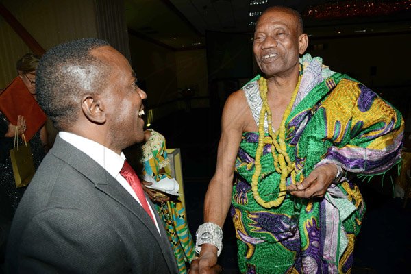 Rudolph Brown/Photographer
Professor Hopeton Dunn greets King Accra Nii Kpobi Tettey, Tsuru III of Ghana at Admark 50th Anniversary Banquet at the Jamaica Pegasus on Tuesday, April 14