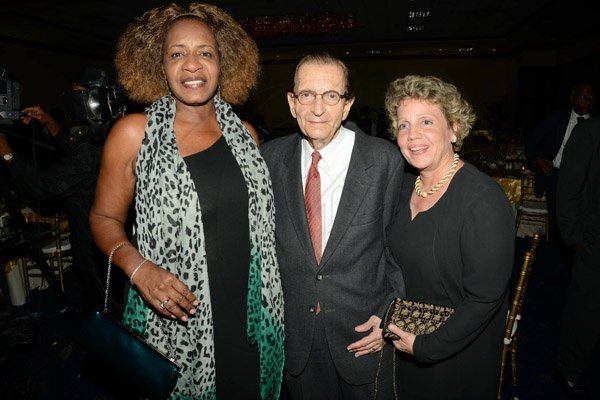 Rudolph Brown/Photographer
Andrea Francis, (left) pose with Edward Seaga, Former Prime Minister and his wife Carla Seaga Admark 50th Anniversary Banquet at  at the Jamaica Pegasus on Tuesday, April 14