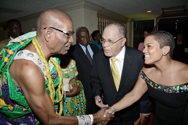 Rudolph Brown/Photographer
Alexisse Chin and Arnold Foote greets King Accra Nii Kpobi Tettey, Tsuru III (left) of GhanaAdmark 50th Anniversary Banquet  at the Jamaica Pegasus on Tuesday, April 14