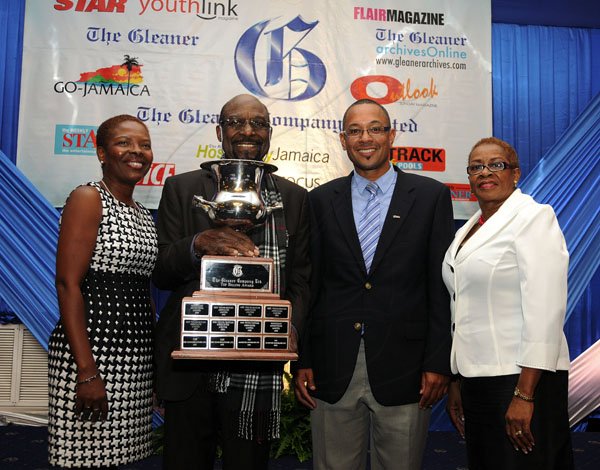 Gladstone Taylor / Photographer

The Marketing Counselors boss Adrian Robinson (second left) shows off the Top Billing award at The Gleaner's Advertisers' Appreciation and Agency Awards luncheion yesterday at the Jamaica Pegasus hotel. Sharing the moment are Gleaner executives (from left) Nordia Craig, advertising operations manager; Christopher Barnes, managing director; and Karin Cooper, business development and marketing manager.