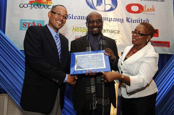 Gladstone Taylor / Photographer

Gleaner Managing Director Christopher Barnes (left) and Gleaner Business Development and Marketing Manager Karin Cooper, present Adrian Robinson of The Marketing Counselors with the Top Billing award plaque.

Jamaica Gleaner hosts advertisers appreciation and agency awards luncheion held at the jamaica Pegasus, kingston
