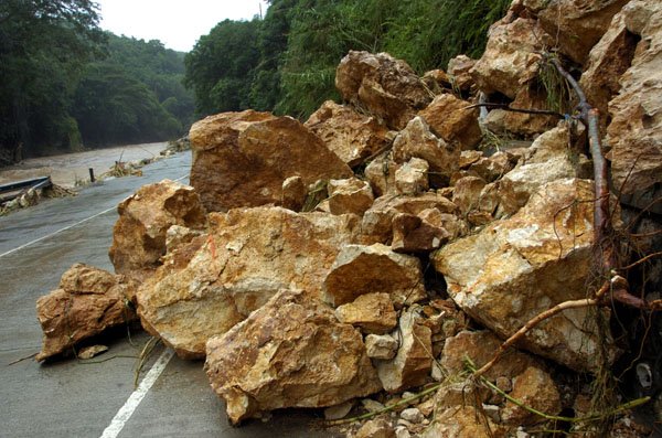 Ricardo Makyn/Staff Photographer.
Rocks that have blocked a section of the Road way in the Gorge on Thursday 30.9.2010.