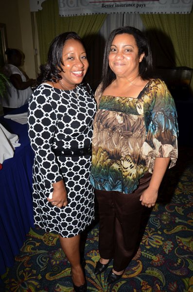 Rudolph Brown/Freelance Photographer
The official opening and cocktail of the Association of Insurance Institute of?Caribbean AIIC 14th Annual Insurance education conference for Caribbean host by Insurance Institute of Jamaica at the Knutsford Court Hotel in Kingston on Wednesday, November 9-2011.
Ann-Marie Hernardez, (left) pose with Sharon Lais