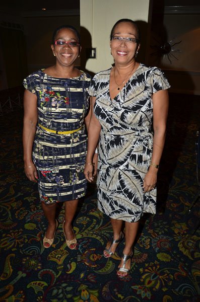 Rudolph Brown/Freelance Photographer
The official opening and cocktail of the Association of Insurance Institute of?Caribbean AIIC 14th Annual Insurance education conference for Caribbean host by Insurance Institute of Jamaica at the Knutsford Court Hotel in Kingston on Wednesday, November 9-2011.
Heather Bowie, (left) pose with Sharon Smith at the official opening and cocktail of the Association of Insurance Institute?of the Caribbean opening conference.
