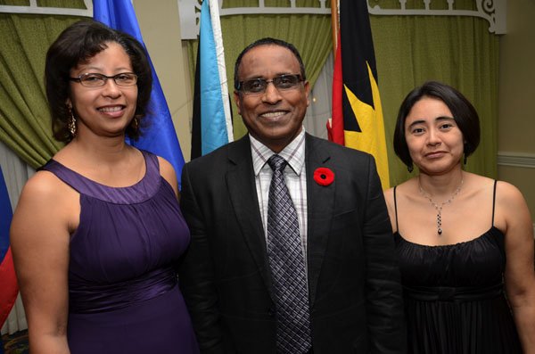 Rudolph Brown/Freelance Photographer
The official opening and cocktail of the Association of Insurance Institute of?Caribbean AIIC 14th Annual Insurance education conference for Caribbean host by Insurance Institute of Jamaica at the Knutsford Court Hotel in Kingston on Wednesday, November 9-2011.
Cecil Jaipaul pose with Melissa Gallegio, (left) and Lydia Leacock?at the Association of Insurance Institue of the Caribbean conference.