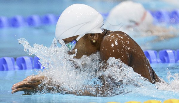 Ricardo Makyn/Staff Photographer
Alia Atkinson winning Her Heat in the Women's 100 M Breaststroke  to move an to the Semifinal at the Aquatics Centre at the Olympic Park.