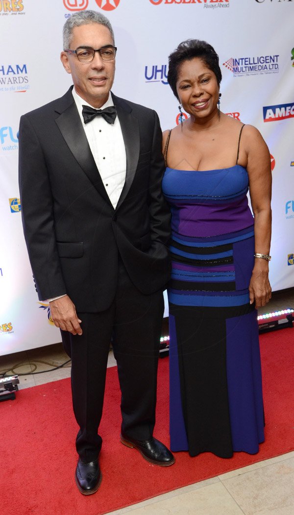 Rudolph Brown/Photographer
Sagicor's Richard Byles is all smiles with his gorgeous wife  Jascinth at the AMCHAM Civic Leadership Awards for Excellence 2014 at the Jamaica Pegasus Hotel in New Kingston on Thursday October 23, 2014