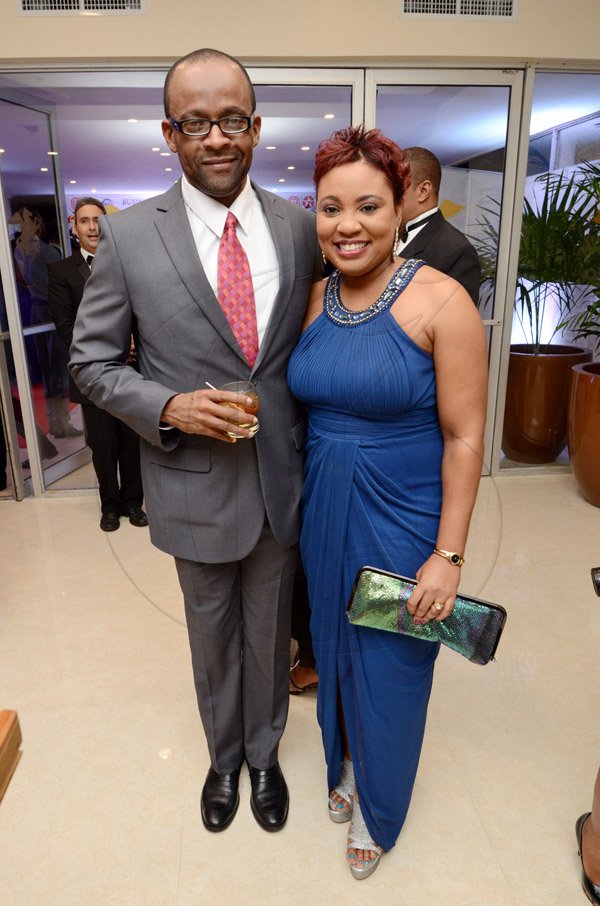 Rudolph Brown/Photographer
Donovan White (Vice President of Marketing and Sales, Flow) pose with  Gail Sommerville-Abrahams, director of corporate communications, Columbus Business Solutions at the AMCHAM Civic Leadership Awards for Excellence 2014 at the Jamaica Pegasus Hotel in New Kingston on Thursday October 23, 2014