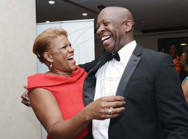 Rudolph Brown/PhotographerDevon Barrett, group chief investment officer at Victoria Mutual AMCHAM Business and Civic Leadership awards 2017 at the Jamaica Pegasus Hotel on Wednesday, October 18, 2017 *** Local Caption *** ContributedA very hearty laugh between Michelle Wilson and Devon Barrett, group chief investment officer at Victoria Mutual AMCHAM Business and Civic Leadership awards 2017 at the Jamaica Pegasus Hotel on Wednesday.