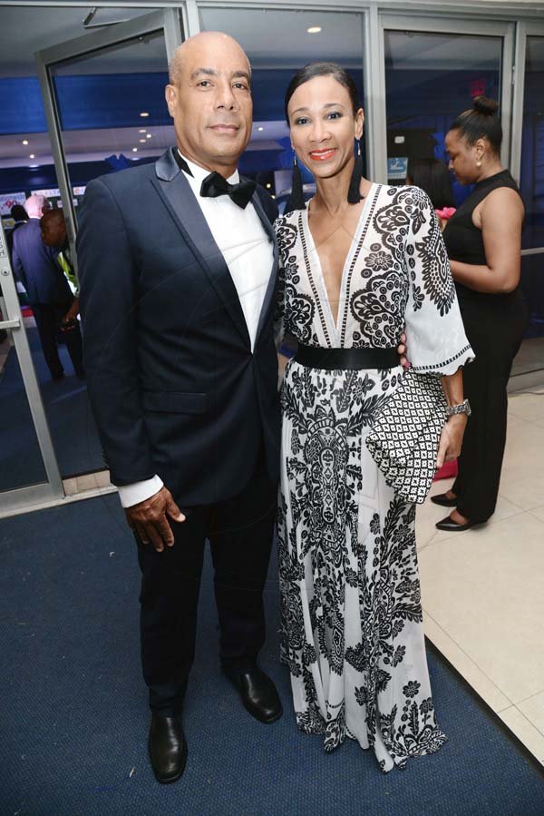 *** Local Caption *** @Normal:Melanie Schwapp and her husband, Phillip, arrive at Wednesday’s AMCHAM Business and Civic Leadership Awards for Excellence at The Jamaica Pegasus hotel.