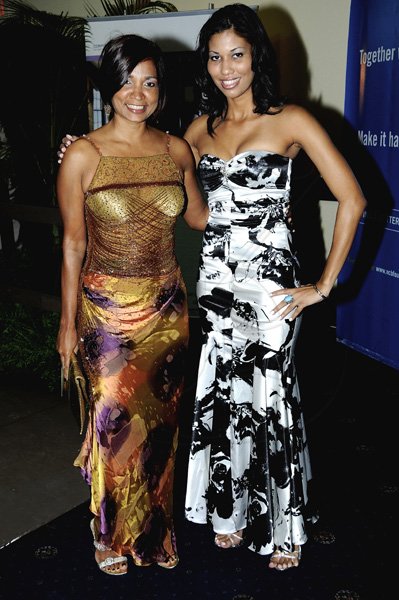 Winston Sill / Freelance Photographer
Flow's dynamic Denise Williams (left) and Nicole Campbell pose for Something Extra  at Monday night's AMCHAM Business and Civic Leadership Awards gala. See today's Section D for more.

********************************************************************* (right).The AMCHAM Business and Civic Leadership Awards Gala anmd Presentation, held at the Jamaica Pegasus Hotel, New Kingston on Monday night September 26, 2011. Here are Denise Williams (left); and Nicole Campbell (right).