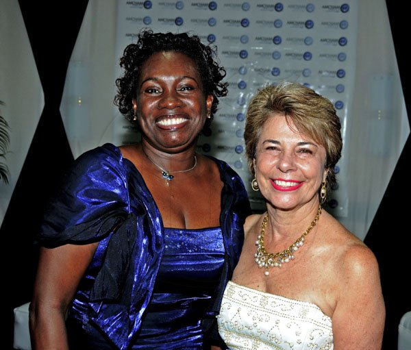 Winston Sill / Freelance Photographer
The AMCHAM Business and Civic Leadership Awards Gala anmd Presentation, held at the Jamaica Pegasus Hotel, New Kingston on Monday night September 26, 2011. Valerie Neil (left); and Diana Stewart (right).