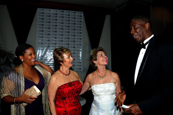 Winston Sill / Freelance Photographer
The AMCHAM Business and Civic Leadership Awards Gala anmd Presentation, held at the Jamaica Pegasus Hotel, New Kingston on Monday night September 26, 2011. Here are Tammie Parnell (left); Becky Stockhausen (second left); Diana Stewart (second right); and Isiah Parnell (right).