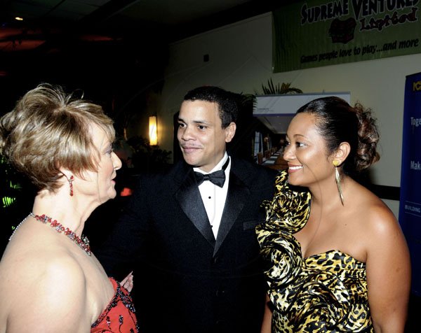 Winston Sill / Freelance Photographer
 Becky Stockhausen (left) greets Andrew and Paula Pairman .


****************************************************************(right).The AMCHAM Business and Civic Leadership Awards Gala anmd Presentation, held at the Jamaica Pegasus Hotel, New Kingston on Monday night September 26, 2011. Here are Becky Stockhausen (left); Andrew Pairman (centre); and Paula Pairman (right).