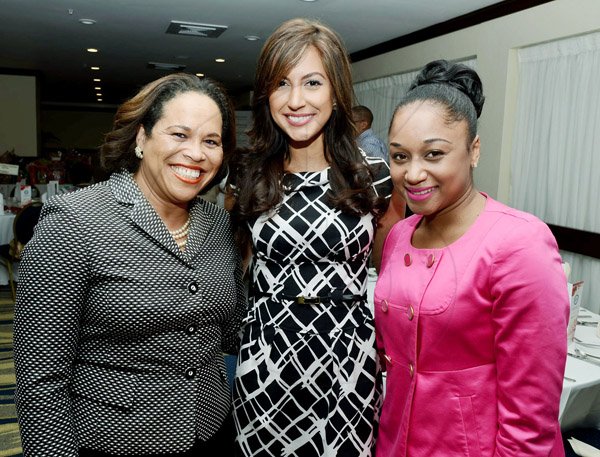 Rudolph Brown/Photographer
Sharing lens time are the gorgeous trio of (from left) Anne Marie Stewart of VIP Attractions,  Kerrie Baylis of RCW Capital  and Digicel's Renee Reid.