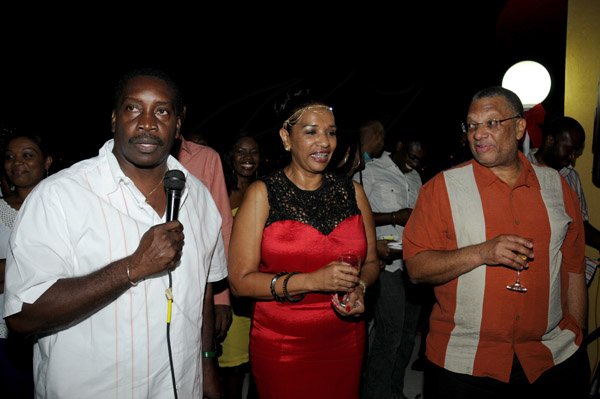 Winston Sill / Freelance Photographer
Angela Amir host a party to celebrates her Birthday in fine style with family and friends, held at Mahoe Avenue, Long Mountain on Saturday night December 15, 2012. Here are Robert Montaque (left); Angela Amir (centre); and Minister Peter Phillips (right).