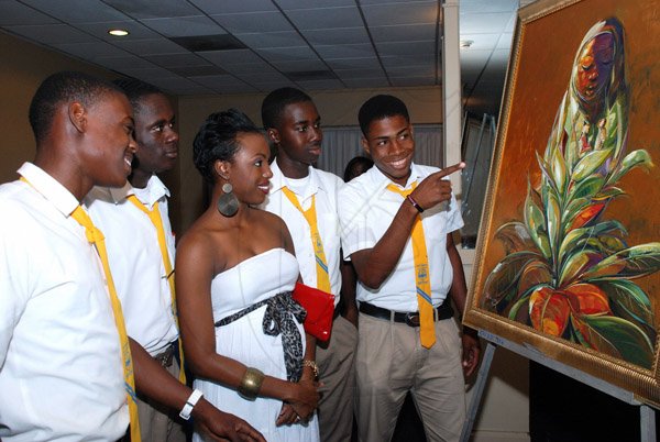 Colin Hamilton/Photographer                                                                                                                                                                       Marketing Manager at Linstead Market Ltd. Geanne Dwyer (center) with students of the Seaforth High.                                                                       .............................................................................................................................................Liguanea Lodge Art Auction - May 16 - Pegasus