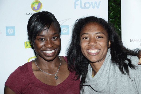 Winston Sill/Freelance Photographer
Dinner for Athletes who participated in the Jamaica International Invitational (JII) track and field meet, held at the Jamaica Pegasus Hotel, New Kingston on Friday night May 2, 2014. Here are Jeneba Tarmoh (left); and Kori Carter (right).