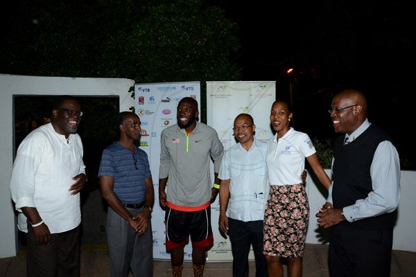 Winston Sill/Freelance Photographer
Dinner for Athletes who participated in the Jamaica International Invitational (JII) track and field meet, held at the Jamaica Pegasus Hotel, New Kingston on Friday night May 2, 2014. Here are Rainford Wint (left); Donald Quarrie (second left); Lashawn Merritt (third left); Dr. Warren Blake (third right); Terri-Karelle Reid (second right); and Ian Forbes (right).