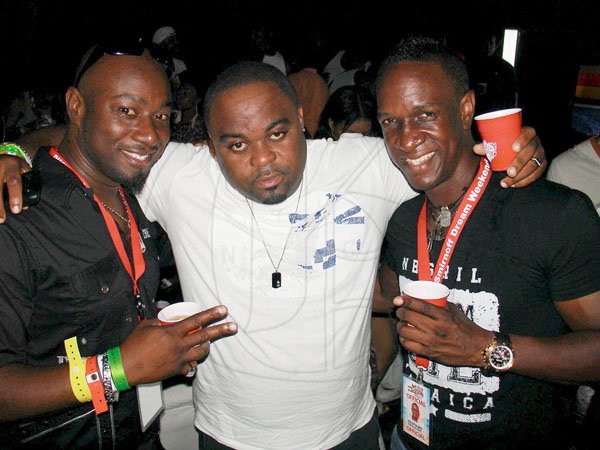 Contributed
Twisted - Dream promoters Garth Walker (left) and Philip 'PP' Palmer (right) welcome Gregory Christian to the mix during Smirnoff Twisted Spirits at Amazon Beach, Negril, part of the Smirnoff Dream weekend on Friday.

********************************************************************** July 29th.