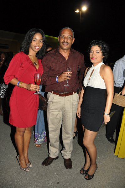 Janet Silvera Photo
 
Captain Gail Ranglin, Col. Desmond Edwards and Melissa Chang at the opening of ATL Automobile store at Bogue City Centre in Montego Bay last Friday night.