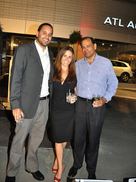 Janet Silvera Photo  
 
From L- Dominic Delgado, his wife Katie and father Jaime at the opening of ATL Automobile store at Bogue City Centre in Montego Bay last Friday night.
