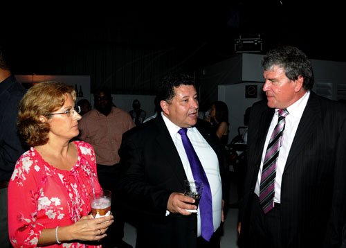 Winston Sill / Freelance Photographer
ALT Autohaus launch new Audi A6 motor car, held at Sandals Hangar, Tinson Pen Aerodrome, Marcus Garvey Drive on Wednesday night January 18, 2012. Here are Dulce Cantero (left); Diego Ramos (centre), Vice President, Audi, Latin America; and Brian Stevenson (right), Managing Director, ATL Autohaus.