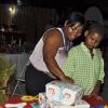 Janet Silvera Photo
 
 Audi Allen-Lawson cuts her Louis Vuitton cake with son Kyle Bowen at a farewell party in her honour at the Aquasol Theme Park, Montego Bay last Friday night