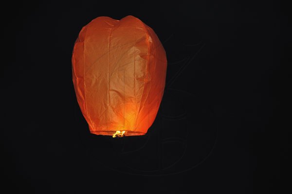 Janet Silvera Photo
 
A floating lantern lights the sky bidding goodbye and farewell to former Digicel employee Audi Allen-Lawson at a party in her honour at the Aquasol Theme Park in Montego Bay last Friday.