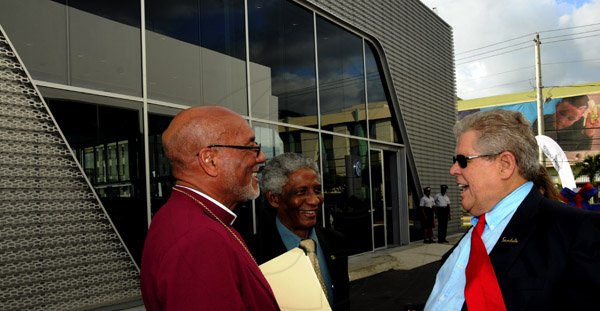 Winston Sill / Freelance Photographer
Prime Minister Portia Simpson-Miller officially open ATL Automotive, Volkswagen and Audi Showrooms, held at Oxford Road, New Kingston on Friday night April 19, 2013. Here are Anglican Bishop Rt. Rev. Dr. Howard Gregory (left); Prof. Neville Ying (centre); and Gordon "Butch" Stewart (right).