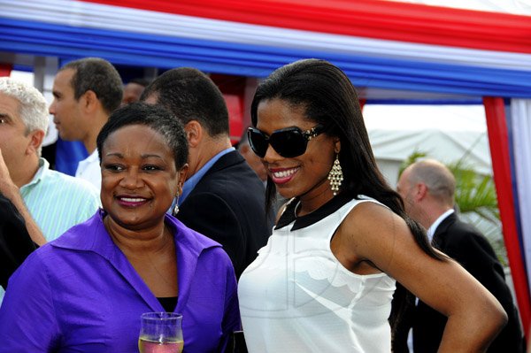 Winston Sill / Freelance Photographer
Prime Minister Portia Simpson-Miller officially open ATL Automotive, Volkswagen and Audi Showrooms, held at Oxford Road, New Kingston on Friday night April 19, 2013. Here are Minna Israel (left); and Kenee?? Linton-George (right).