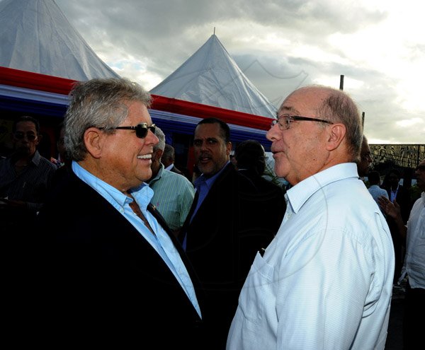 Winston Sill / Freelance Photographer
Prime Minister Portia Simpson-Miller officially open ATL Automotive, Volkswagen and Audi Showrooms, held at Oxford Road, New Kingston on Friday night April 19, 2013. Here are Gordon "Butch" Steawrt (left); and William McConnell (right).
