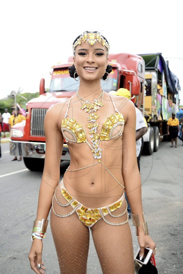 Patrick Planter/ Photographer<\n>Miss Universe Jamaica 2014 Kaci Fennell shimmers in gold, making the road march her very own runway for Bacchanal Carnival 2017.<\n>Bacchanal Jamaica Road March on Sunday April 23, 2017 at 9:00am