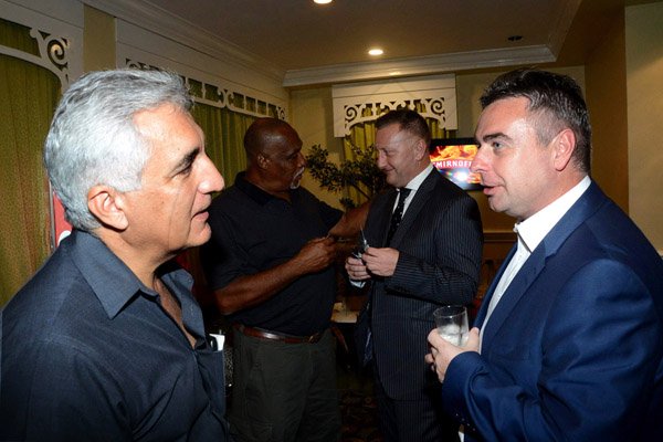 Winston Sill/freelance Photographer
 Bacchanal Jamaica presents the Official Launch of Bacchanal 2015 Carnival Season, under the theme "Untamed", held at Knutsford Court Hotel, Ruthven Road on Thursday night February 5, 2015.  Here are Michael Ammar (left), Director, Bacchanal Jamaica; Earl Franklin (second left), Director, Bacchanal Jamaica; Matthew Cripps (second right), Group General Manager, ATL Automotive; and Brian Walsh (right).